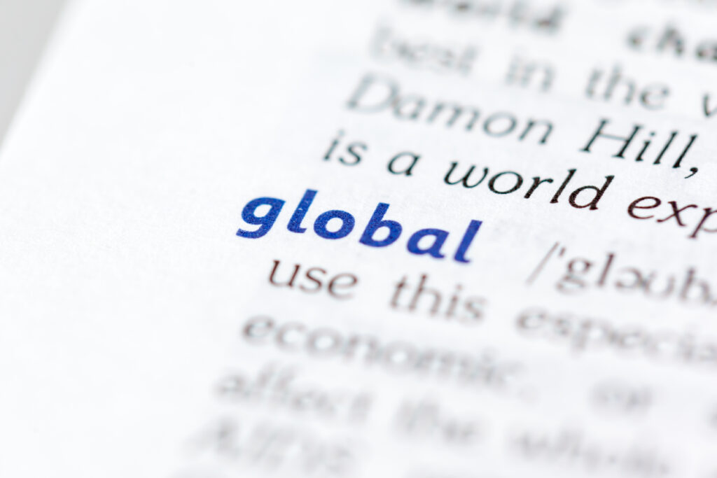 Close-up of the word “global” highlighted in a dictionary, symbolising the Global Talent visa and its international focus.