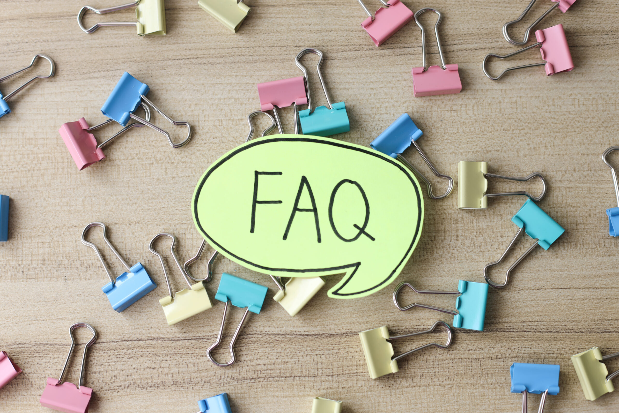 A simplified guide showing applicants exploring answers to frequently asked questions about the UK Global Talent visa in 2025.