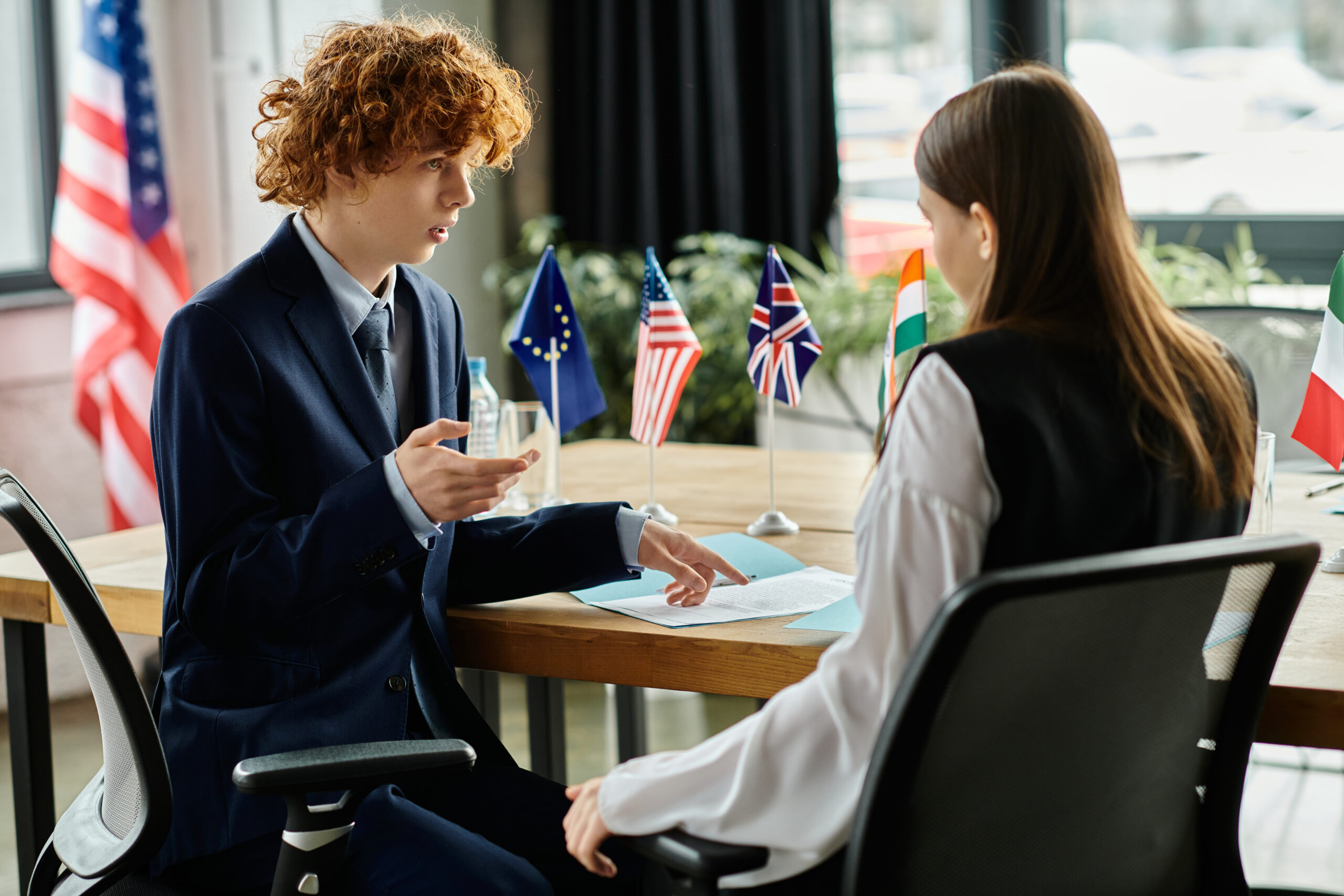 Applicant reviewing documents and preparing a new Global Talent visa application after a refusal.