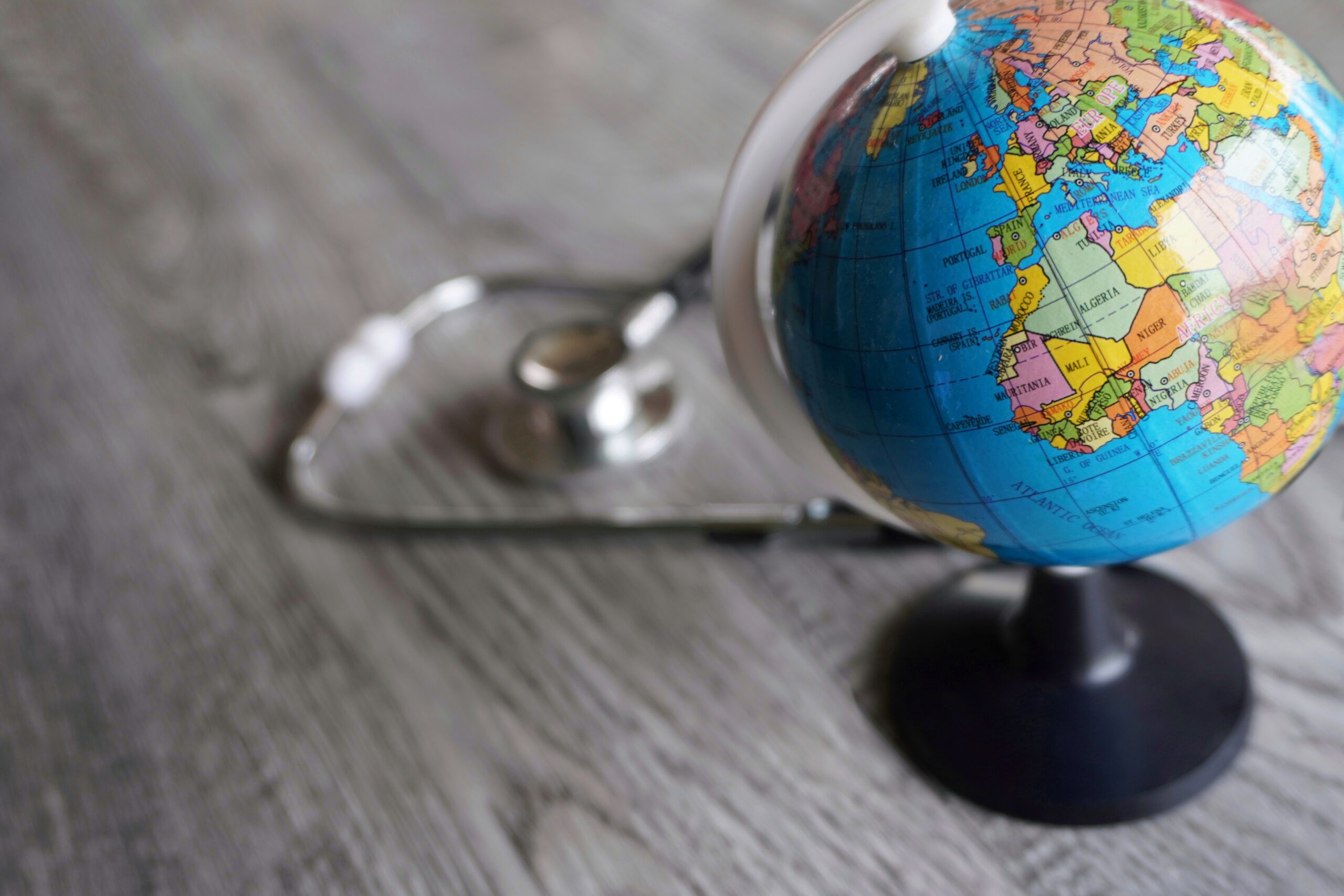 An international professional completing a UK Global Talent visa application online while travelling abroad, symbolising the overseas application process.