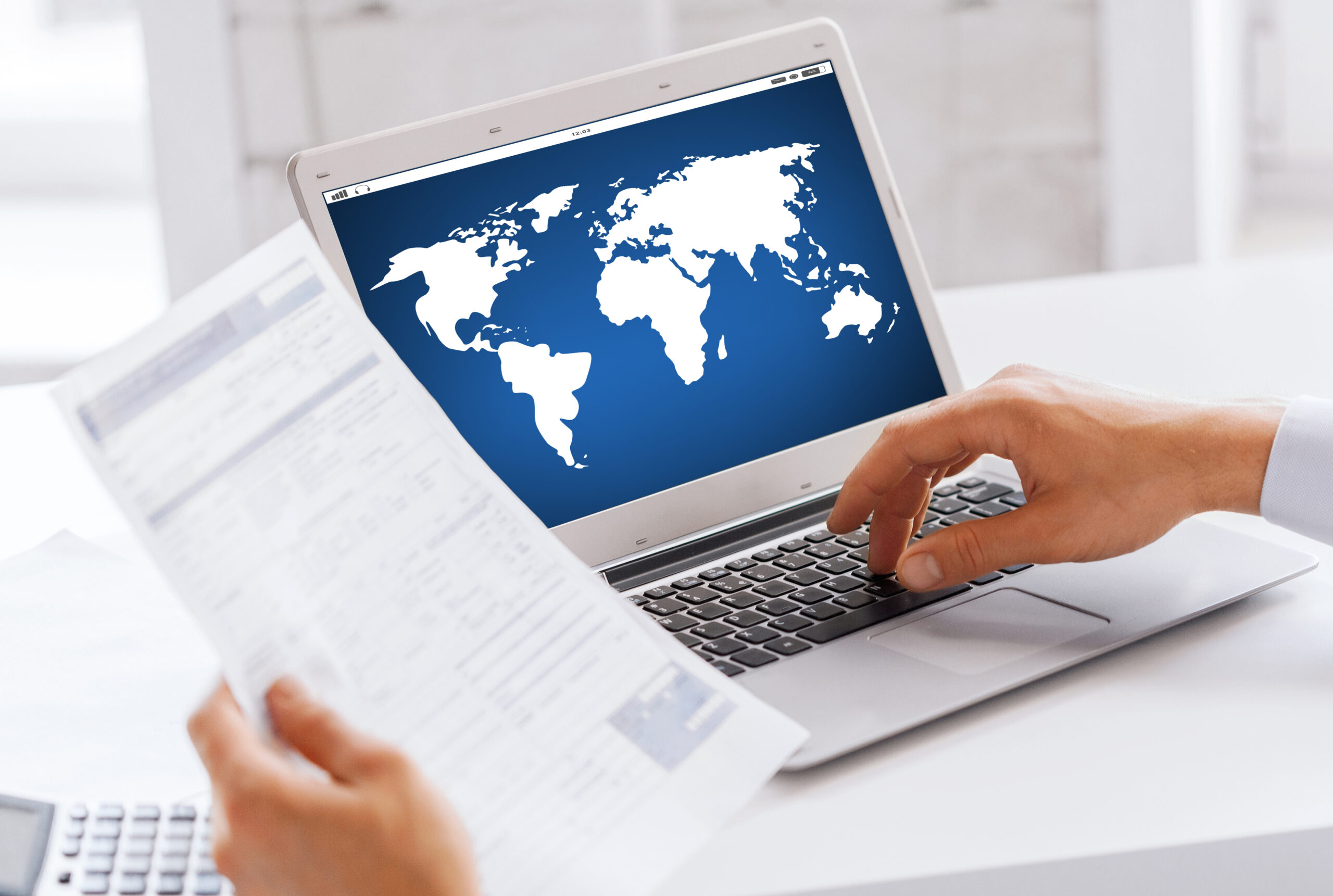 A professional reviewing their Global Talent visa application status on a laptop, checking official updates and notifications.