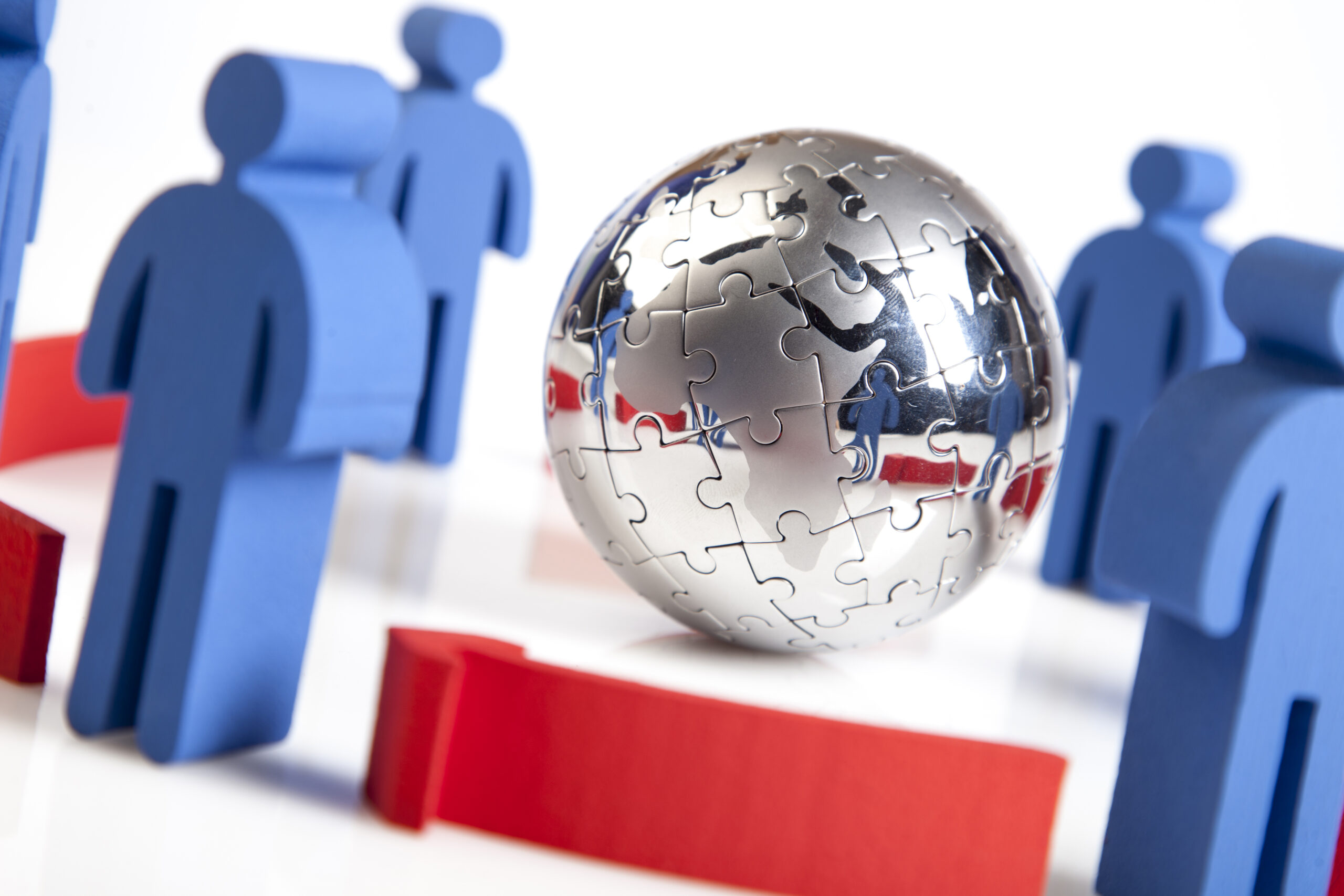 A frustrated professional reviewing a rejection letter on a laptop, surrounded by reference letters and a CV, symbolising an endorsement refusal.