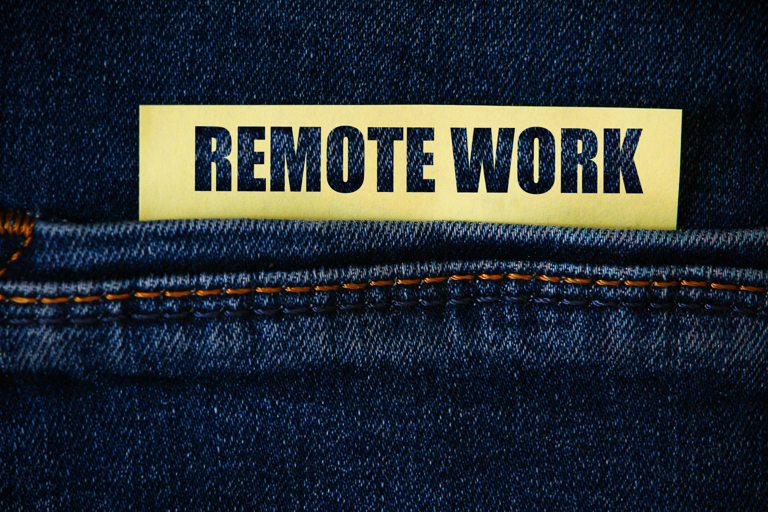 Professional working remotely on a laptop from a home office setup, representing flexibility under the UK Global Talent visa for remote or hybrid workers in 2025.