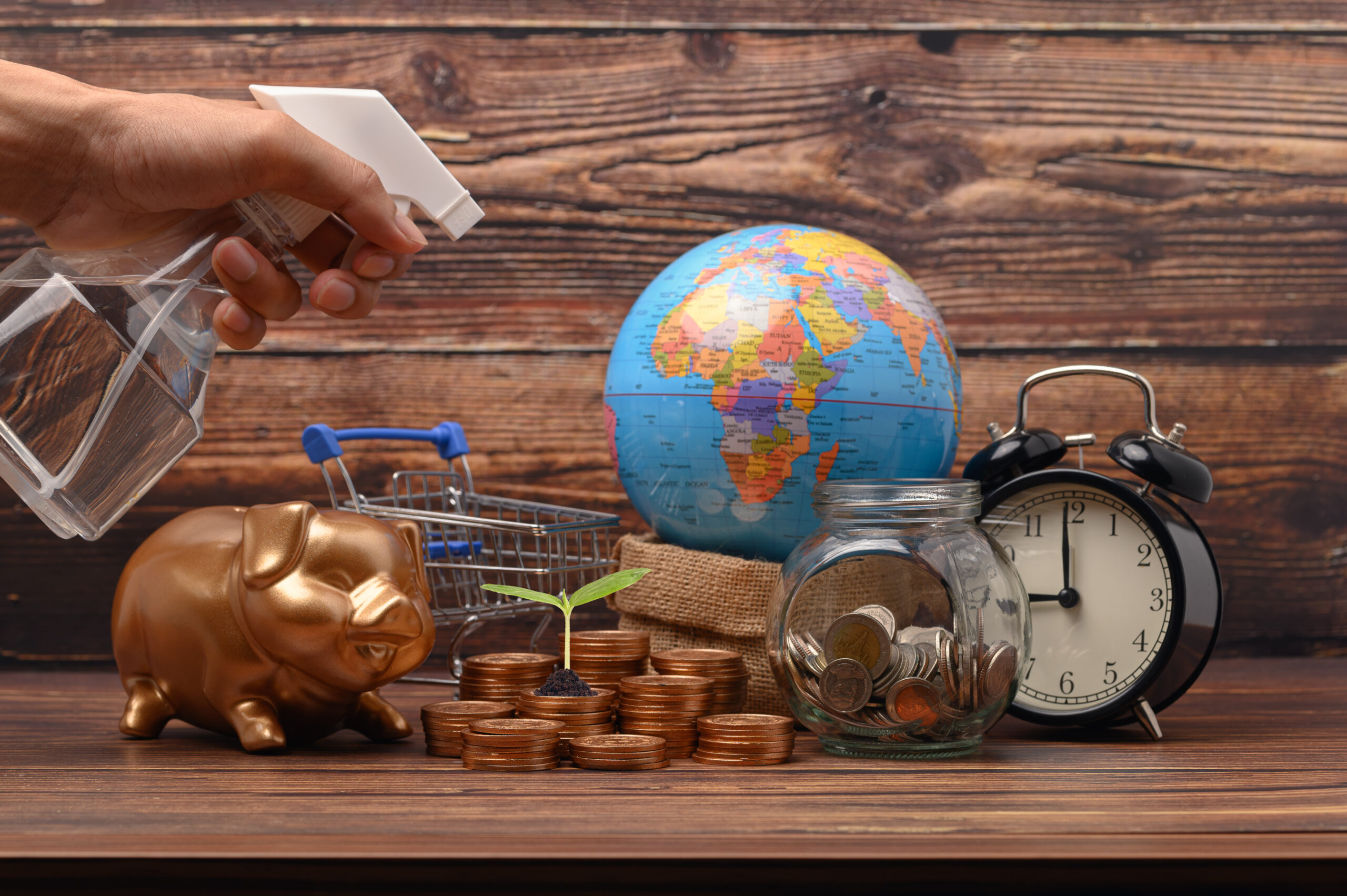 A professional reviewing financial documents and a laptop, representing managing finances as a Global Talent visa holder in the UK.